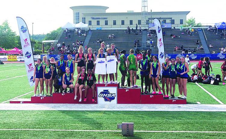 TFS photo. The Tallulah Falls School girls 4X400 relay team (center) -- composed of Dani Prince, Sofia Rueda, Molly Mitchell and Julianne Shirley -- won the state championship in Rome on May 13 with a time of 4:07.70. The Lady Indians took 10th place overall, while the Indians took 25th. 