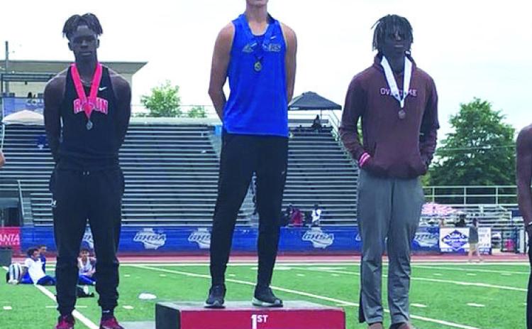 Luke Morey/The Clayton Tribune. Rabun County junior Willie Goodwyn took second place in the high jump at the GHSA State championship meet with a 6-foot-04 mark. Also pictured are Jacob Carruthers (first place) and Damello Jones (third place).