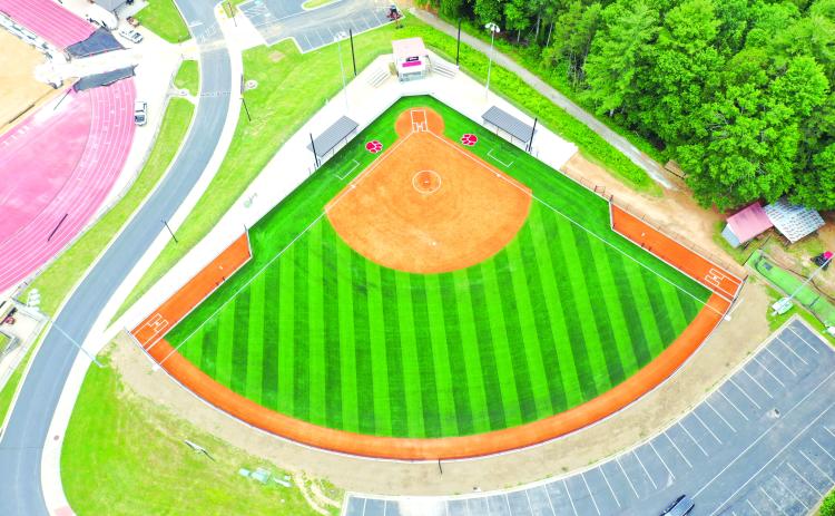 Photo courtesy Jason Hogan. An aerial photo of the newly finished Rabun County softball field shows the new features of the field. Bullpens were added to both sides of the field, as well as new dugouts to go along with the turf field. Two Wildcat logos flank home plate to complete the design.