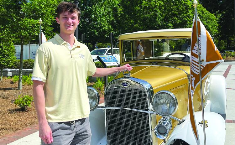 Submitted photo. Standing next to the 1930 Ford Model A Sport coupe Ramblin’ Wreck, Aidan Thompson will be one of the members of the Georgia Tech’s Vertically Integrated Project (VIP) teams. Thompson is the Rabun County High School 2022 salutatorian and STAR Student.