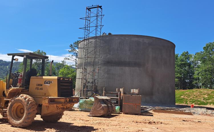 Megan Broome/The Clayton Tribune. Crews continue work on construction of the 750,000 gallon ground-level water storage tank located on Yorkhouse Road in Rabun Gap. It is scheduled to be completed and on line in late September-early October 2023, with a 90-day function testing period to follow. 