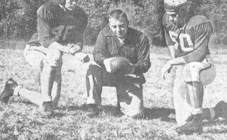 Submitted photo. Quarterback Jack Short (right) with teammate Bill Hunnicutt (left) and coach Frank Snyder.