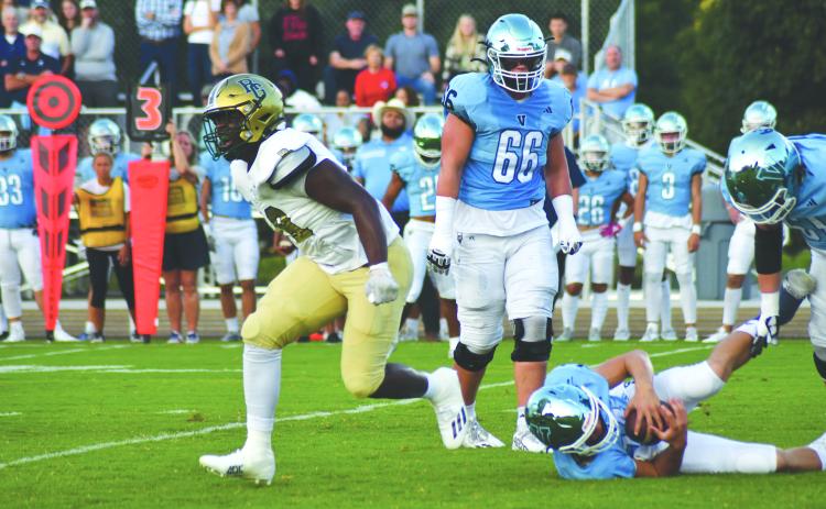 Enoch Autry/The Clayton Tribune. Sophomore James “Tank” Carrington registers one of his three sacks in the game. Carrington now is a five-star and one of the top players in the nation. 