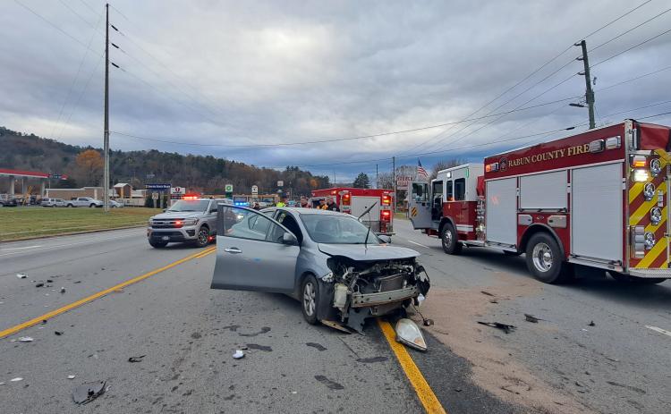 Megan Horn/The Clayton Tribune. Emergency personnel work the scene of a two-vehicle crash at Ga. 15 and Ramey Boulevard. Monday morning. Minor injuries were reported but lanes of travel were shut down for a brief period of time. 