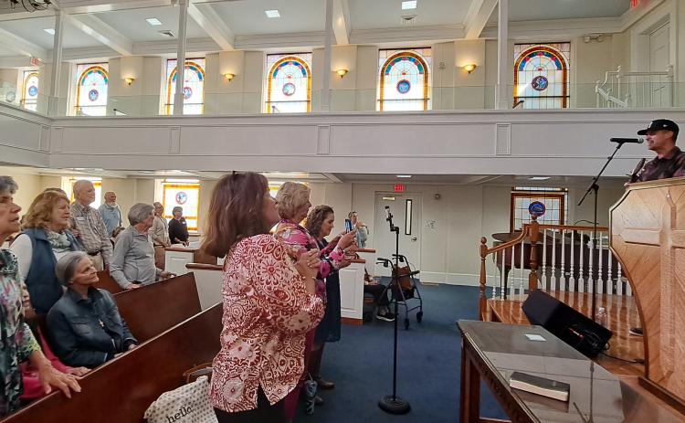Megan Horn/The Clayton Tribune. A well-attended crowd was emotional, praising Jesus as singer/songwriter Kristian Stanfill was a guest performer for the Ladies’ Community Bible Study group at Clayton Baptist Church on Oct. 10. Stanfill has local ties to the Rabun County community.