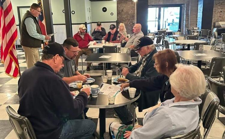 Submitted photo. Forward Rabun Business and Economic Strategist Mickey Duvall (far left) talks with veterans at the Rabun County Civic Center Diner during October’s Vet to Vet Cafe meeting. The group meets the second Tuesday of each month, beginning at 10 a.m. 