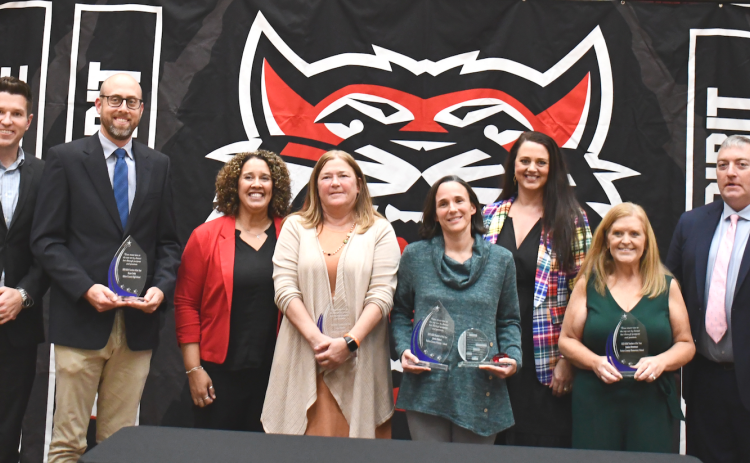 Megan Horn/The Clayton Tribune. Pictured are RCHS Principal Justin Spillers, left; RCHS Teacher of the Year Bryan Getty; RCMS Principal Kechara Partin; RCMS Teacher of the Year Lisa Mooney; RCPS and System Teacher of the Year Jenna Hinkel; RCPS Principal Carla Truelove; RCES Teacher of the Year Jessica Streetman; and RCES Principal Jonathan Welch. 
