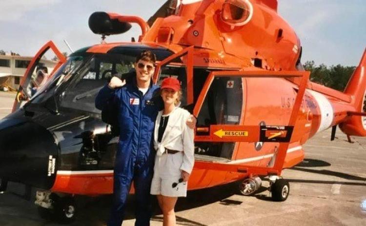 Submitted photo.  Seen here with the H-65 Dolphin he flew at Hunter AAF, Eric Vogelbacher met his eventual wife Lynne in Savannah, Ga. 