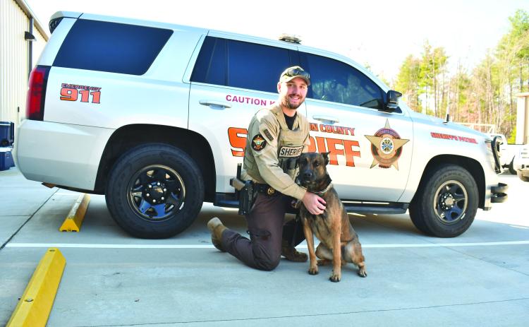 Megan Horn/The Clayton Tribune. Rabun County Sheriff’s Office welcomes K9 Spike to its team on Nov. 6. Cpl. Clinton Scott is the handler for the 2-year-old Belgian Malionois. 
