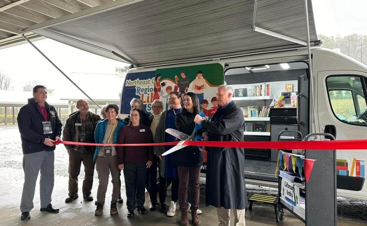 Photo courtesy Forward Rabun/Rabun County Chamber of Commerce. Forward Rabun/Rabun County Chamber of Commerce held a grand opening and ribbon cutting event for the Northeast Georgia Regional Library System Bookmobile on Jan. 24. The motto for the Bookmobile is “spreading library love…one mile at a time.”