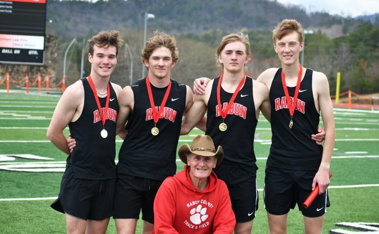 Wade Cheek/The Clayton Tribune. The Rabun County High School boys 4x800 meter relay team of Hayden Smith, Wyatt Word, Harry Word and G.B. Anderson smashed the previous school record by just under seven seconds with a time of 8:45.99.