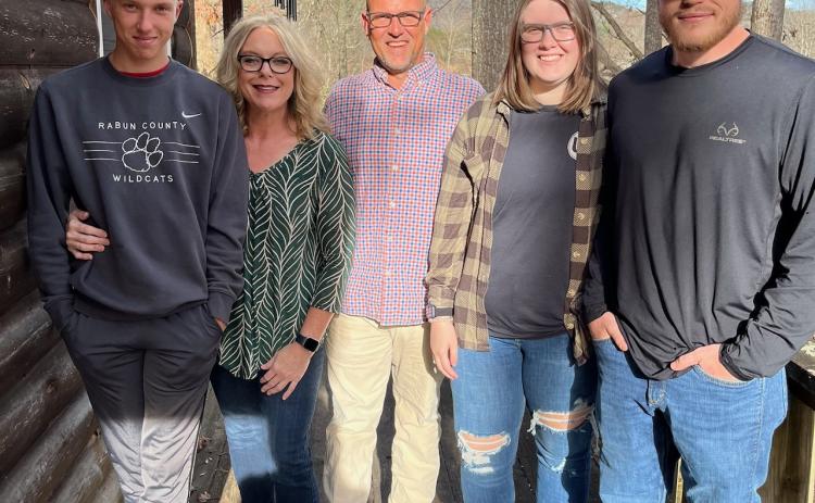 Submitted photo. Rabun County Commissioner and Air Force Reservist Scott Crane returns to active duty in the U.S. Air Force in the role of First Sergeant. He starts his duties April 2 for a minimum of six months. Crane is pictured with his family Colton, Julie, Madelyn and Nolan. 