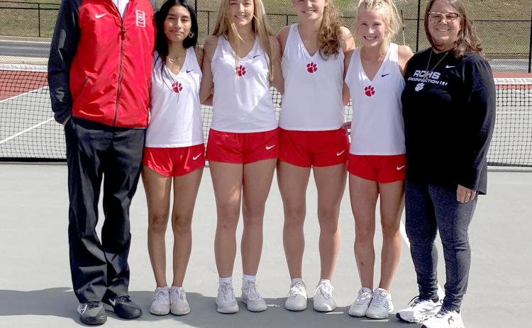 Submitted photo. RCHS head coach Bryan Getty stands with Lady Cat seniors Melanie Gamboa, Aryn Barnett, Lucy Hood and Abby Sego and assistant coach Jennifer Ramey on “Senior Night” for tennis on March 25.