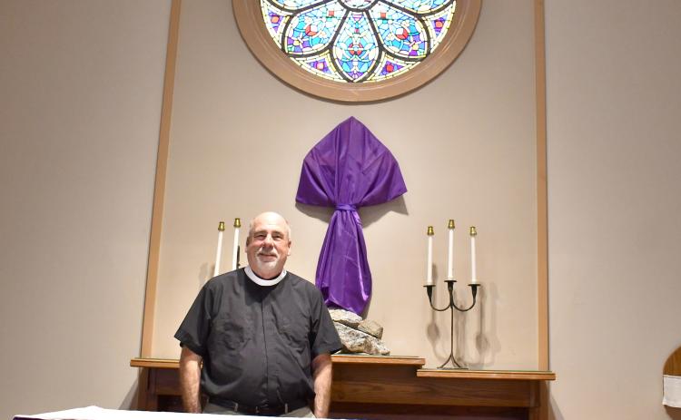 Megan Horn/The Clayton Tribune. Rev. Dr. Jim Shumard has served as Priest of St. James Episcopal Church in Clayton since December. He preaches the message of God’s love and his sermons invite people to have a deeper relationship with Jesus. 